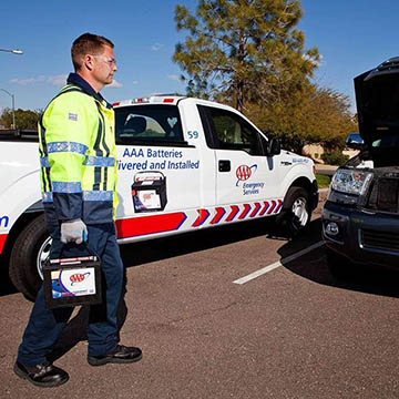 Technician providing roadside assistance